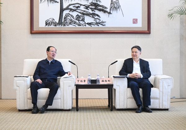 丁焰章與中國華能董事長、黨組書記溫樞剛會談